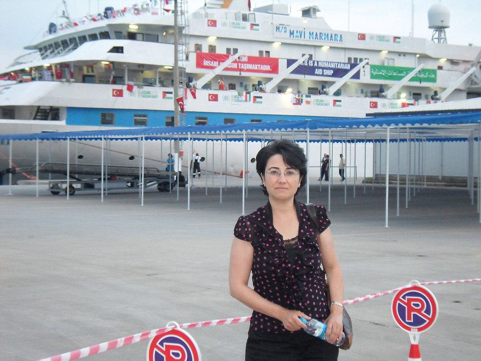 Zoabi next to the Mavi Marmara