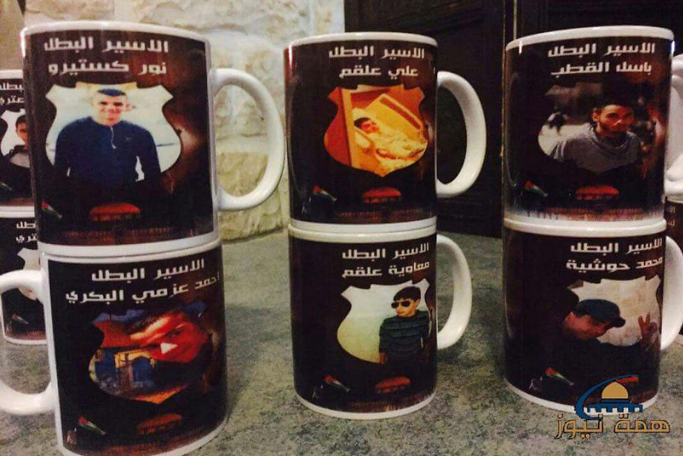 Each family was given a mug with a photo of its jailed relative on it.