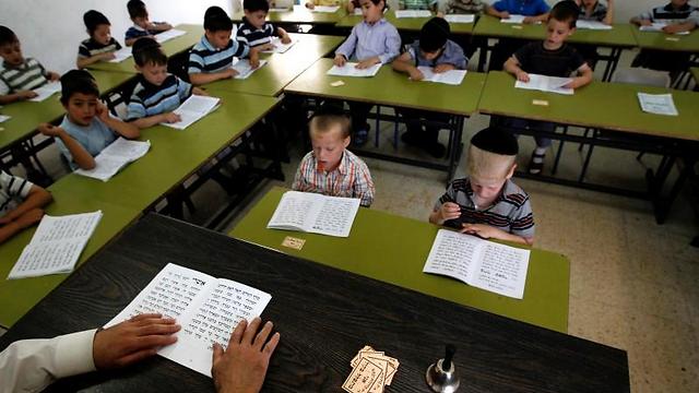 Ultra-Orthodox students attend a religious studies class at Kehilot Yaacov Torah School for boys in Ramot neighborhood in Jerusalem (Photo: Reuters) (Photo: Reuters)
