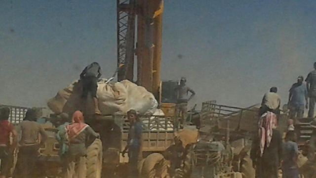 The crane which was delivering food to the Syrians (Photo: AP)