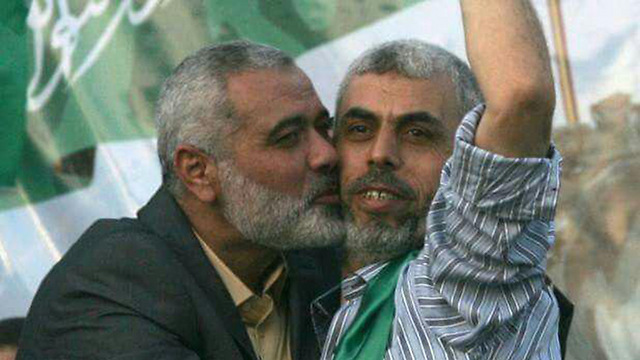 Ismail Haniyeh with Sanwar after his release in the Shalit deal