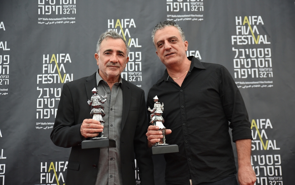 Ivgy (left), Issa, and their best actor awards. (Photo: Galit Rosen)