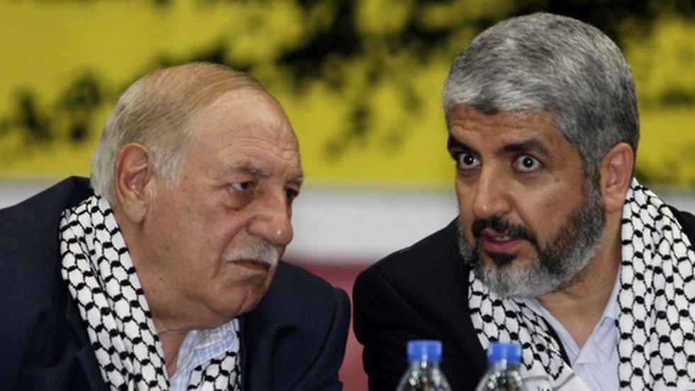 Ahmed Jibril, left, with Hamas leader Khaled Mashal (Photo: Reuters)