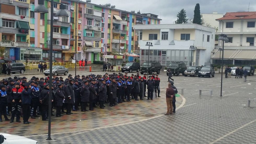 Albanian police protecting Israeli and Albanian soccer players (Photo: Nadav Tzantzifer)