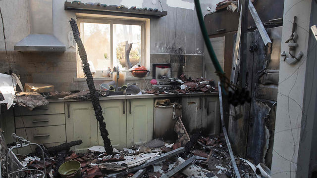 Homes in Haifa left uninhabitable (Photo: AFP)
