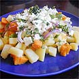 סלט תפוחי אדמה ובטטה עם גבינה בולגרית. 15 ₪