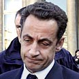 לא מחייך כהרגלו. סרקוזי