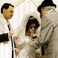 Bride sips the wine 