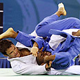Israel's Gal Yekutiel (blue) 