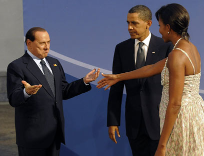 ראש ממשלת איטליה עם זוג "השזופים", ברק ומישל אובמה (צילום: AFP) (צילום: AFP)