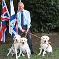 Ambassador Phillips with Daisy, Romy and Rocko  