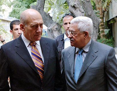 Abbas and Olmert. 'Truth will come out eventually' (Photo: Reuters)