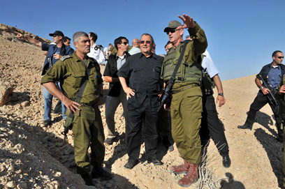 From left: Maj.-Gen. Rousso, Defense Minister Barak and Chief of Staff Gantz at scene of attack (Photo: Defense Ministry)