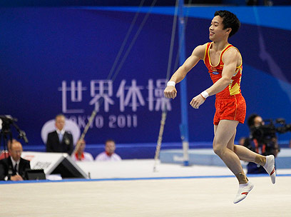 האלוף האולימפי מבייג'ינג. זו קאי הסיני (צילום: רויטרס) (צילום: רויטרס)