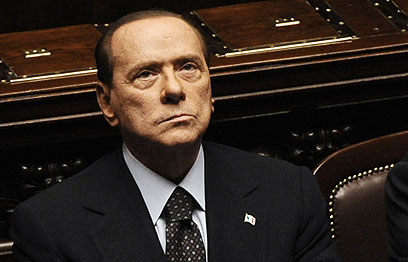 ראש ממשלת איטליה המתפטר ברלוסקוני (צילום: AFP) (צילום: AFP)