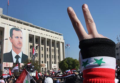 בביטאון הממסדי נכתב: "המהפכה היא עמוד תווך בהיסטוריה של סוריה" (צילום: AP) (צילום: AP)