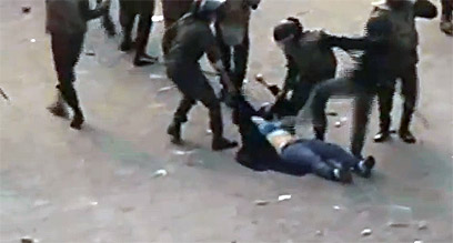 Women beaten by security officers in Cairo