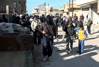 מורדים בעיר רסטן שבמחוז חומס (צילום: AFP) (צילום: AFP)