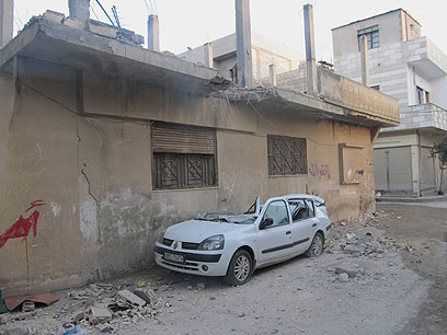 נזקי הפגזת הצבא הסורי בחומס, לפני שבוע (צילום: רויטרס) (צילום: רויטרס)