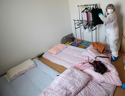 הכול נשאר בדיוק באותו מקום. היטושי קורודה בחדר השינה שלה (צילום: רויטרס) (צילום: רויטרס)