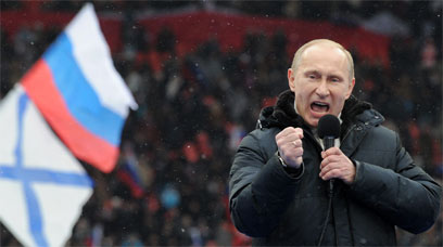 פוטין נואם בעצרת. "אני אוהב אותו והוא אוהב אותי" (צילום: AFP) (צילום: AFP)