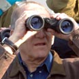 Olmert observing