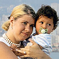 Laura Gabriel and her adopted child