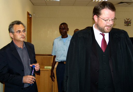 Kobi Alexander (left) meeting with legal counsel in Namibia