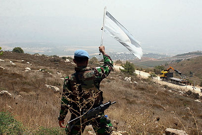 חייל של כוח יוניפי"ל בדרום לבנון. אסור להחזיק נשק מדרום לליטני (צילום: AFP) (צילום: AFP)