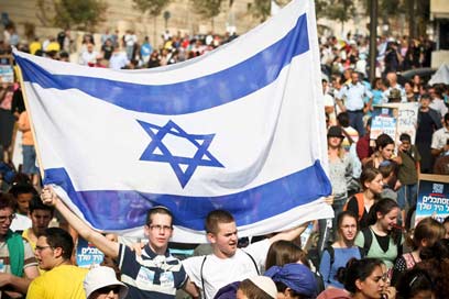 Religious Zionist voters are interested in preventing the evacuation of communities, they are afraid of a peace agreement which won't bring peace, but the Bayit Yehudi party is just too small (Archive photo: Noam Moskovich)