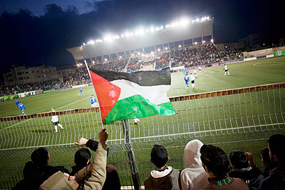Crowds watch team 'Palestine' play Thailand near Ramallah (Photo: AP)