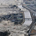 צילום: AP Photo/Kyodo News
