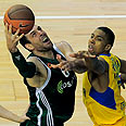Maccabi's Richard Hendrix (R) and Panathinaikos' Aleks Maric 