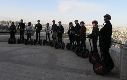 Scholars mount segways before touring Jerusalem (Photo: Project Interchange/AJC) 