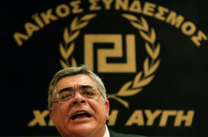 מנהיג המפלגה הניאו נאצית, ניקולאוס מיכלוליאקוס (צילום: רויטרס) (צילום: רויטרס)