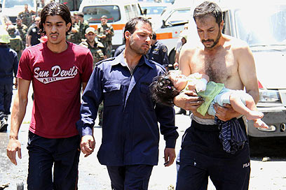 פגיעה שגרתית בילדים. קרבות ליד דמשק (צילום: רויטרס) (צילום: רויטרס)