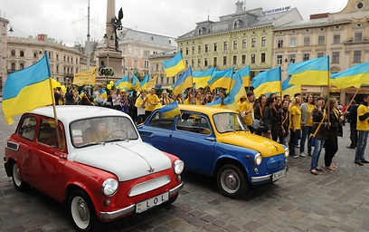 אוהדים אוקראיניים. שבה: "גאה באופן שבו אירחנו את הטורניר" (צילום: AFP) (צילום: AFP)