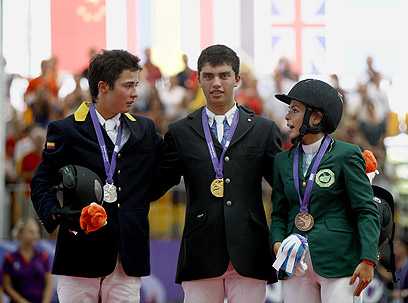מדליית ארד באולימפיאדת הנוער. ומה בלונדון? מלחאס הסעודית (מימין) (צילום: EPA) (צילום: EPA)