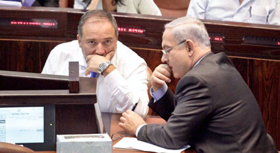 Lieberman and Netanyahu. It turns out that the new rightist-haredi government is not rightist enough and not national enough for the Yisrael Beytenu chairman (Photo: Noam Moskovich)