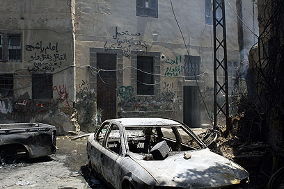 הרס בשכונה בבירה הסורית (צילום: AFP) (צילום: AFP)