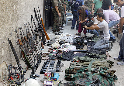 כלי נשק בדמשק. סוריה חמושה מכף רגל עד ראש (צילום: AFP) (צילום: AFP)