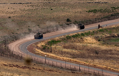 כלי רכב של צה"ל בגבול הסורי (צילום: AP) (צילום: AP)