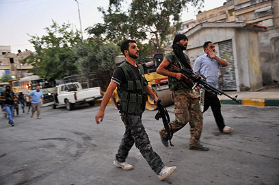 מורדים בעיר חלב, השבוע (צילום: AFP) (צילום: AFP)