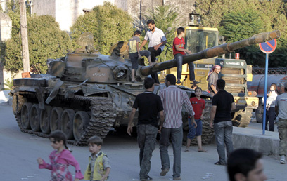 טנקים סורי שננטש בעיר חלב (צילום: AFP) (צילום: AFP)