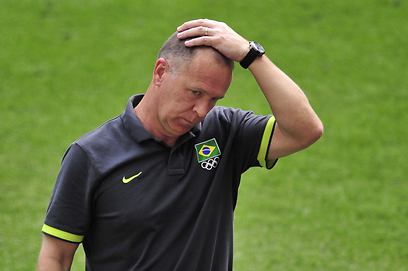 יכול לפתור לו כמה בעיות. מאנו מנזס, מאמן ברזיל (צילום: AFP) (צילום: AFP)