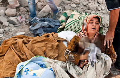 נפגעים בהפצצה (צילום: AFP) (צילום: AFP)