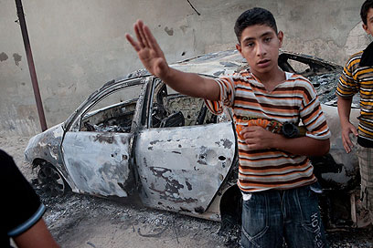 בחלק מהמקומות, נערים צעירים משתתפים בלחימה (צילום: AFP) (צילום: AFP)