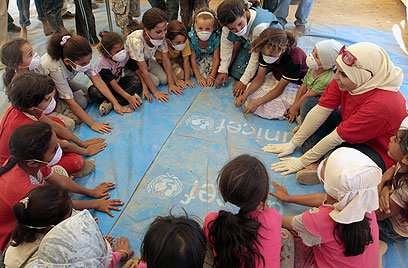 ילדים משחקים במחנה פליטים בירדן (צילום: AFP) (צילום: AFP)