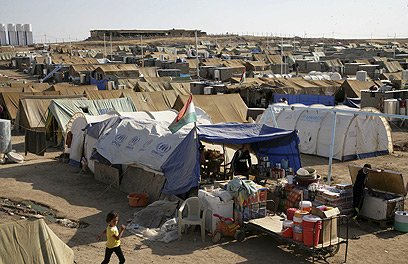 עשרות אלפי פליטים הגיעו למחנות בטורקיה, ירדן ועיראק (צילום: AFP) (צילום: AFP)