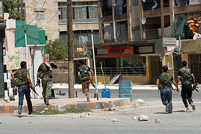 אחראים לפיגוע בדמשק? מורדים בחלב (צילום: רויטרס) (צילום: רויטרס)